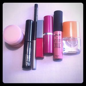 Bundle of lipsticks, eyeliner, mascara, & eyecream